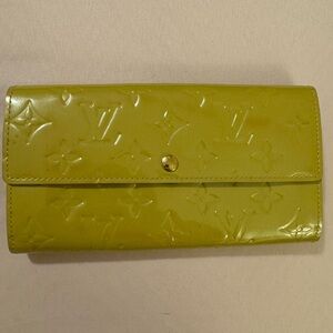 LOUIS VUITTON • WALLETS AND CARDHOLDERS
Excellent condition pre owned